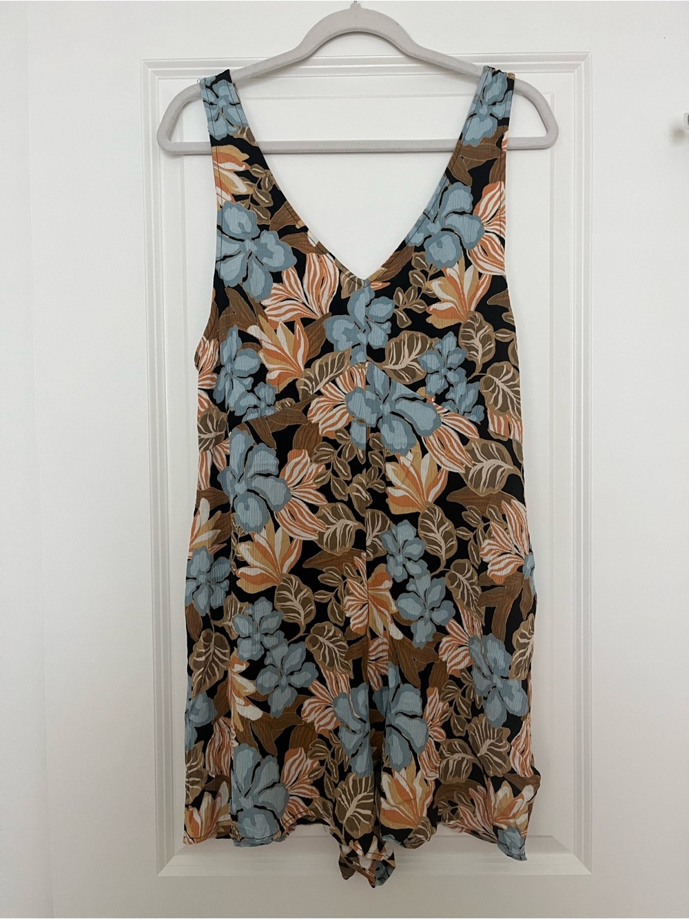 Rip Curl Black Floral V-Neck Romper with Blue & Tan Blooms